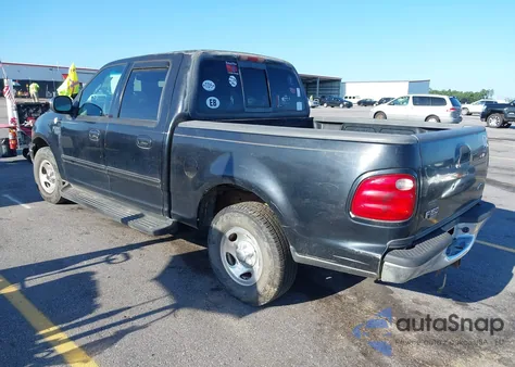 2001 Ford F150 Supercrew из США, поврежденный, VIN 1FTRW07L61KC53030
